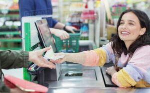 13. Smiling Cashier